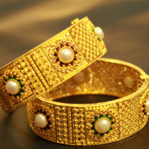 Avantika Culcutti Kada with Polki and Pearls - Exquisite bracelet with Polki stones and pearls.