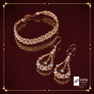 Flamboyant Italian Rose Gold Chokar Set - A stunning necklace and earring set featuring intertwined veins and textured gold balls, inspired by contemporary celebrity jewellery trends.