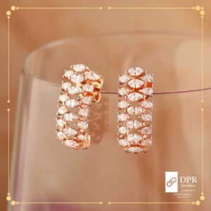 Dazzling Pear Cascade Diamond Earrings - Sparkling pear-shaped diamonds arranged in a cascading design.